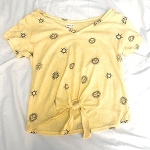 Yellow and Black shirt with suns on it